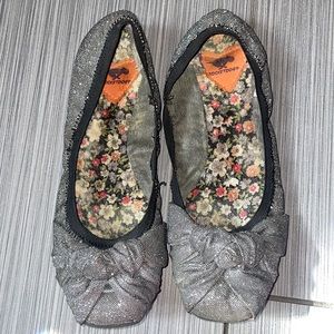 Shiny, silver Rocket Dog flats!
